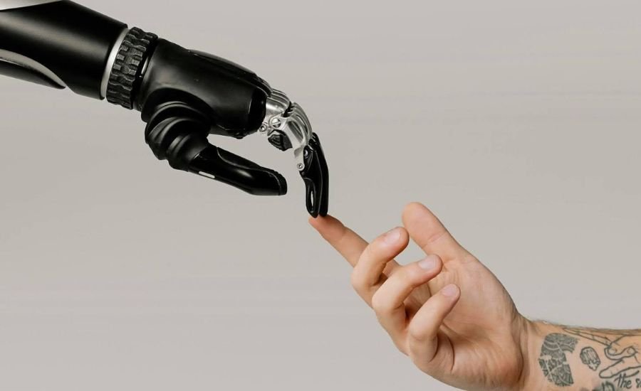 A robotic hand is touching a man's finger, showcasing the usage of artificial intelligence for ad targeting